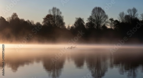 Misty Lake at Sunrise with Reflecting Trees