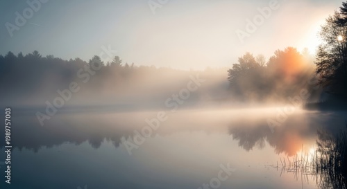 Misty Sunrise Over a Calm Lake and Forest