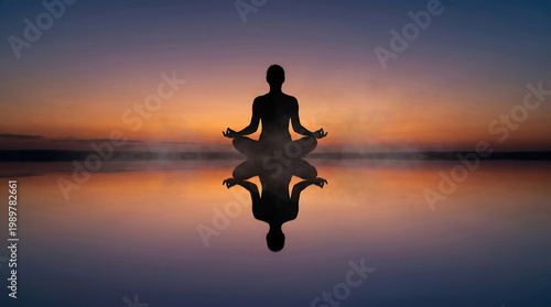 A serene silhouette of a person meditating in a peaceful yoga pose during a vibrant sunset over calm water