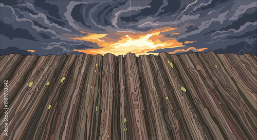 Dramatic Stormy Sky Over Jagged Mountain Ridge at Sunset