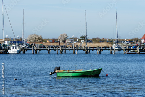 Germany, Mecklenburg Vorpommern, Rerik, April 8, 2026: Green fishing boat mooring in Rerik harbor