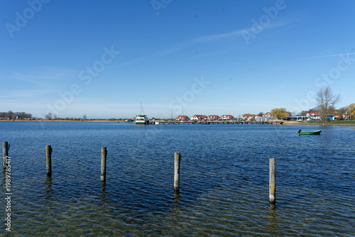 Germany, Mecklenburg Vorpommern, Rerik, April 8, 2026: Rerik Ostsee bay tranquil water and traditional cottages