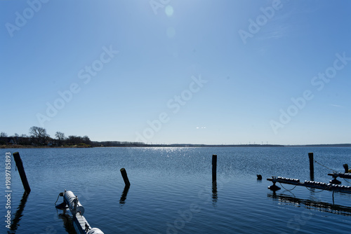 Germany, Mecklenburg Vorpommern, Rerik, April 8, 2026: Rerik Ostsee water reflecting sun under clear sky