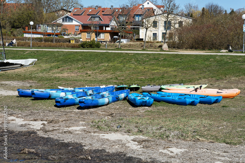 Germany, Mecklenburg Vorpommern, Rerik, April 8, 2026: Rerik Ostsee kayaks on beach with houses behind