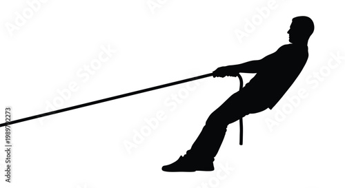 Man pulling a rope with effort depicted in black silhouette