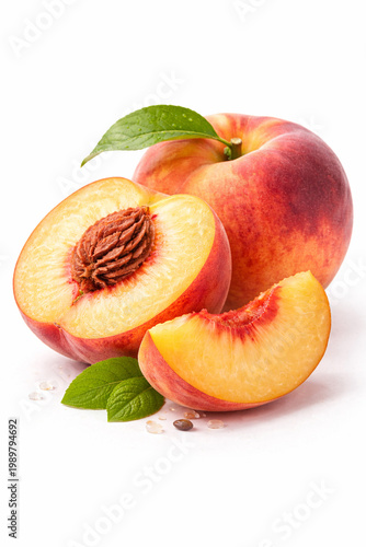 Luscious Peach Still Life: A vibrant display of ripe peaches, one whole, one halved to reveal the juicy interior, and a slice, all complemented by fresh green leaves.