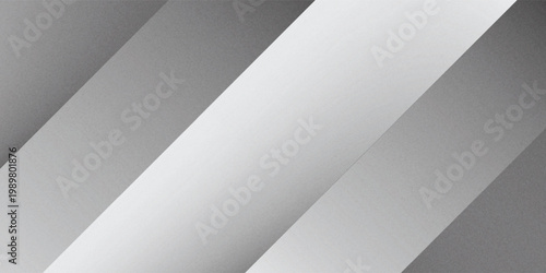 Modern silver metallic background with diagonal gradients and a subtle grainy texture. A sleek, industrial-style abstract design ideal for technology banners and professional backgrounds.