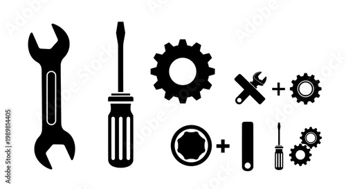 A collection of black and white tools and gears on a plain background