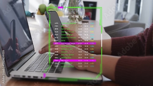 Woman typing at desk, lifting phone, tapping, HUD flickering over keys, highlighting data for work