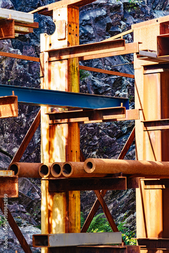 Fotografie Metal pipes on rack