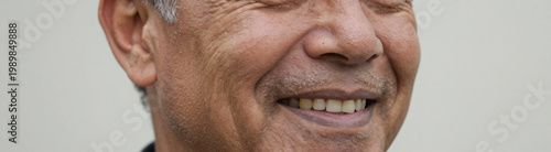 smiling american male capturing intricate texture subtle pores weathered face soft natural