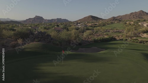 An aerial view of a mountainous golf course in Arizona during the spring.