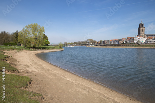 Deventer city panorama with Lebuinus Church over the river