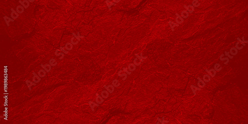 Photos Vibrant red textured background with crumpled paper effect for design and decora