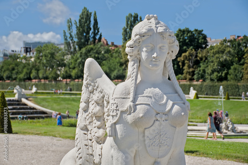 Photography emale sphynx statue in the gardens of Belvedere palace, Vienna, Austria