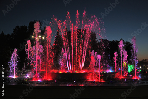 Photos Light and music fountain in Anapa park at night.