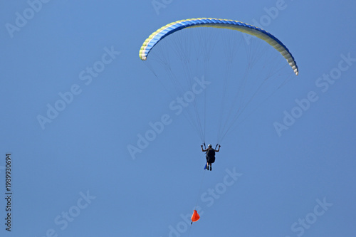 Paraglider being towed by a winch	