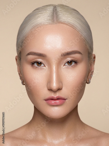 Portrait of asian young woman in beige color