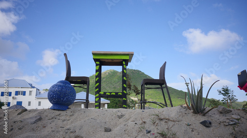old wooden chairs in field