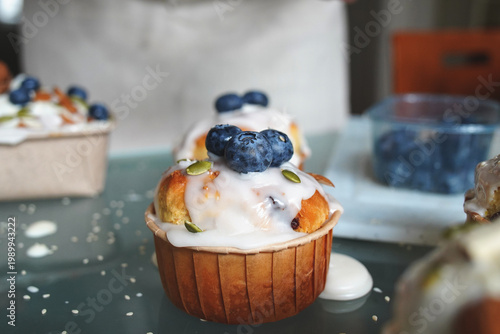 Cupcake with white cream and berries