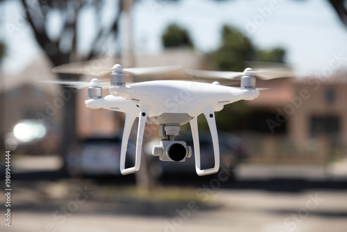 Drone hovers while taking photos
