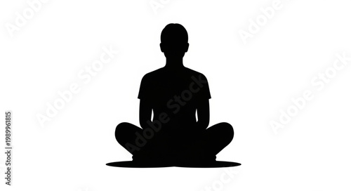 Silhouette of a person meditating in a cross legged pose.