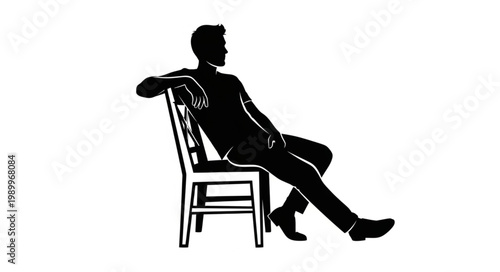 Silhouette of a man sitting on a chair looking away.