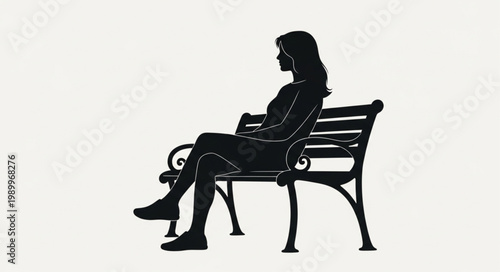 Silhouette of a Woman Sitting on a Park Bench.