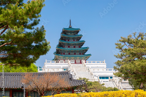 Traditional five-story Korean pagoda tower of the National Folk Museum rising above Gyeongbokgung Palace grounds in Seoul, South Korea