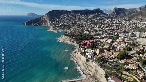 Aerial view of Calpe coastline with cliffs and city Spain