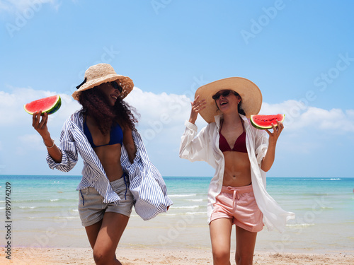 young teen playing and running on the beach