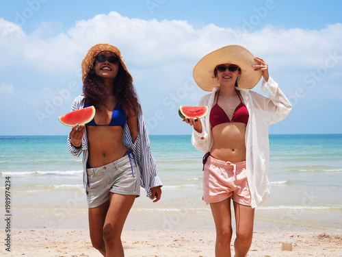 young teen playing and running on the beach