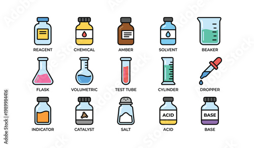 Laboratory bottles and glassware arranged on white grid