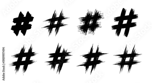 Set of eight hand drawn grunge hashtag symbols in black ink.