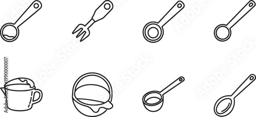 Black and white kitchen utensil measuring spoons and cups
