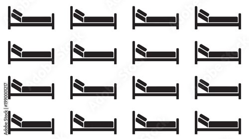 Multiple Beds with Black Sheets.