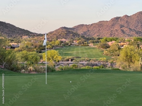 A lust green golf course in Arizona on a clear winter day.