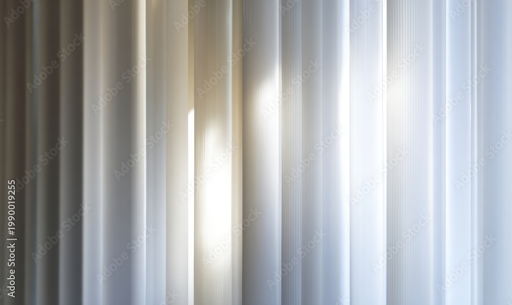 Obraz premium Glowing vertical lines across reflective surface
