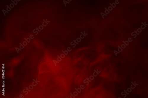 The background is blurred with smoke and abstract red patterns.