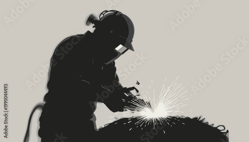 silhouette of a welder on working area