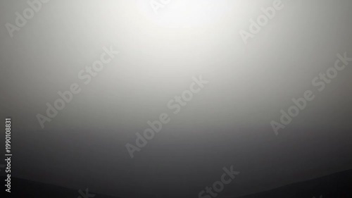 Abstract gradient background, smooth transition from bright white to deep black