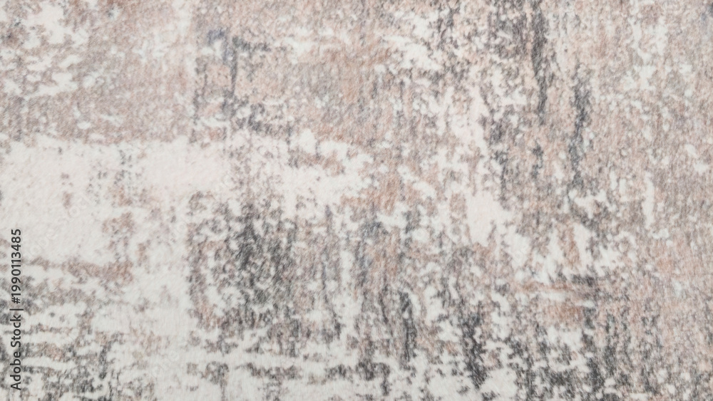 Fototapeta premium Abstract textured surface with distressed pattern featuring light and dark.