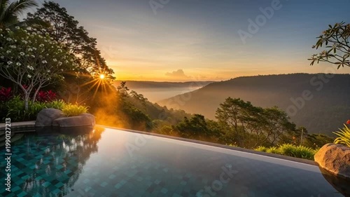 Luxury infinity pool overlooking misty valley at sunrise, tropical resort, serene landscape