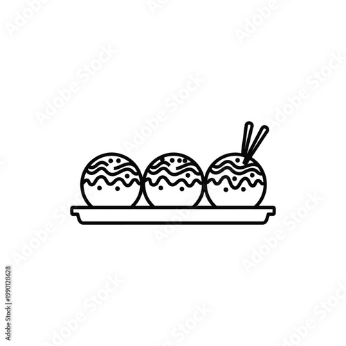 Three decorated desserts on a serving plate with chopsticks