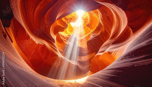 Sunlight dramatically illuminates the swirling sandstone formations within Antelope Canyon, creating a mesmerizing display of light and color.