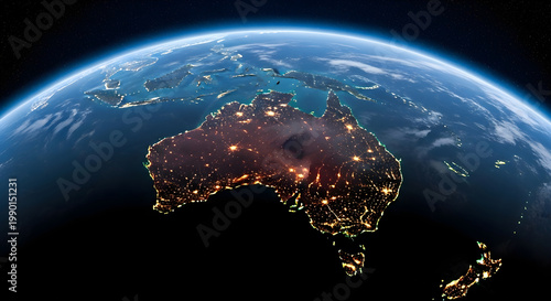 Satellite view of australia at night showing glowing city lights from space