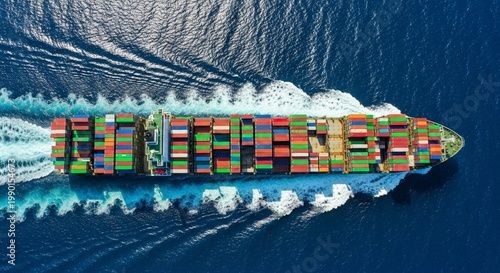 Container Ship Sailing in the Deep Blue Sea Aerial View