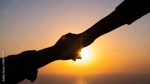 silhouette of a hand holding the sun