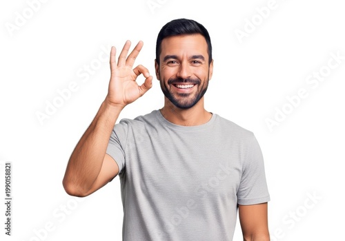 Man making an ok gesture with a cheerful expression and smiling broadly.