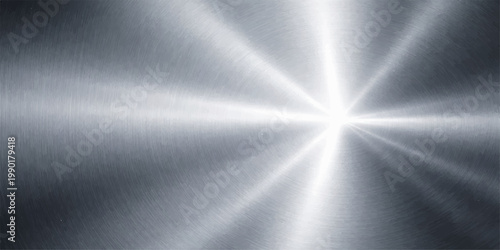 A polished stainless steel plate features a shiny brushed metal texture with a silver metallic pattern and light reflections across a grey aluminum surface backdrop